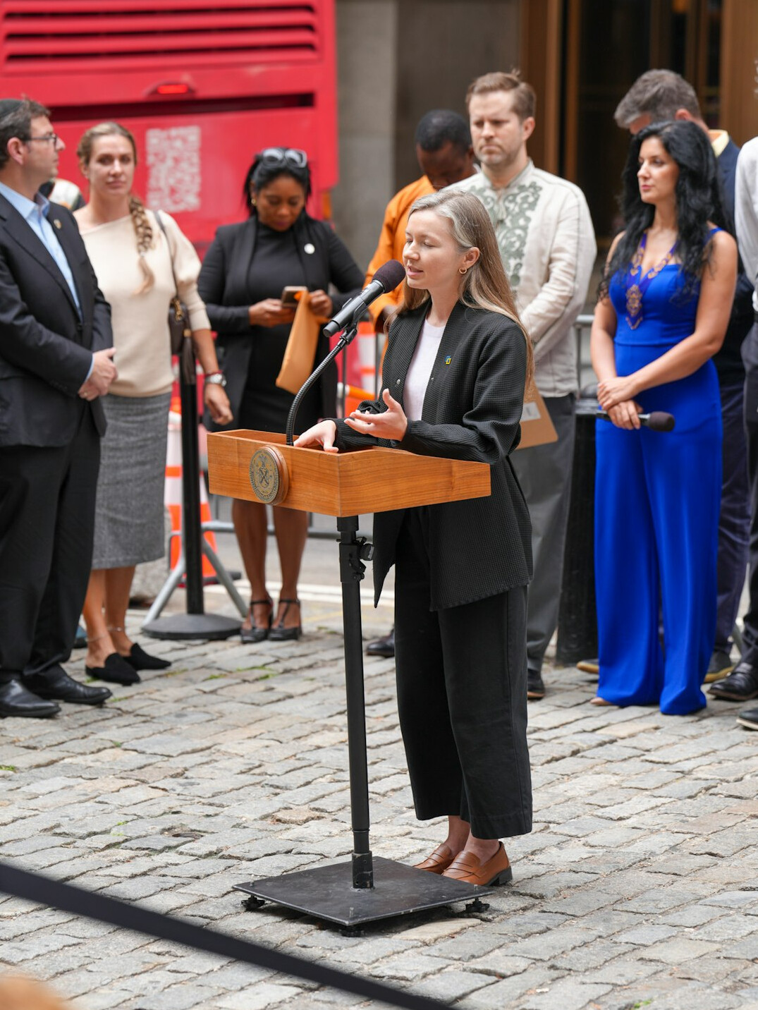 confident woman at podium