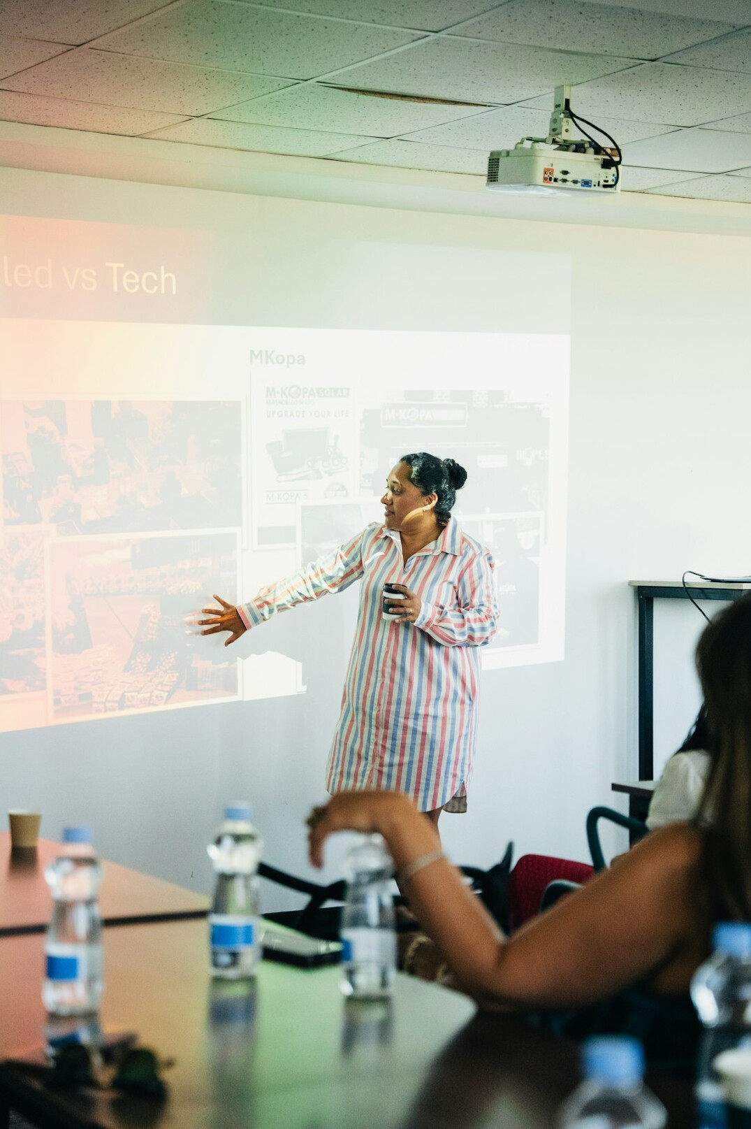 woman presenting to class