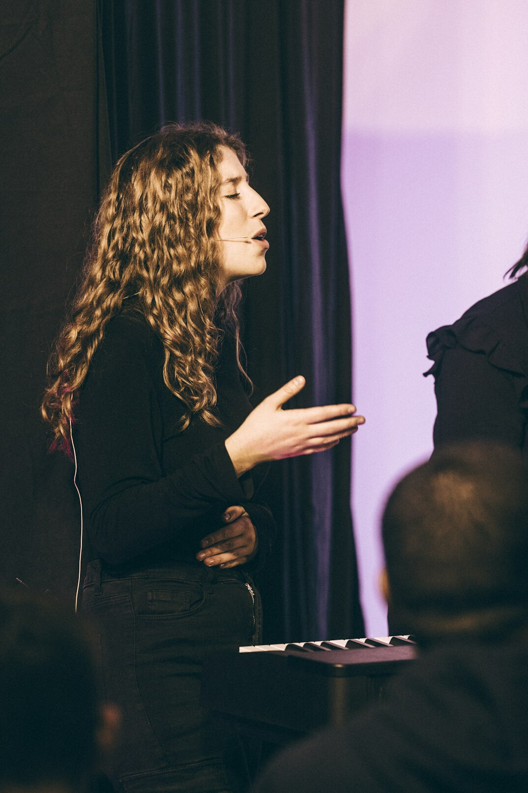 confident woman on stage